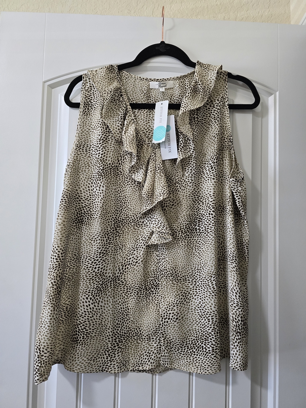 Ruffled Sleeveless Blouse in Cream Leopard Print
